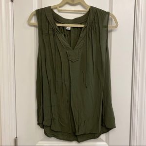 Army green sleeveless blouse with tassels